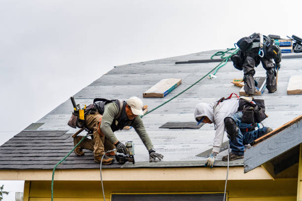 Professional Gutter Installation technician working in Brooks, KY